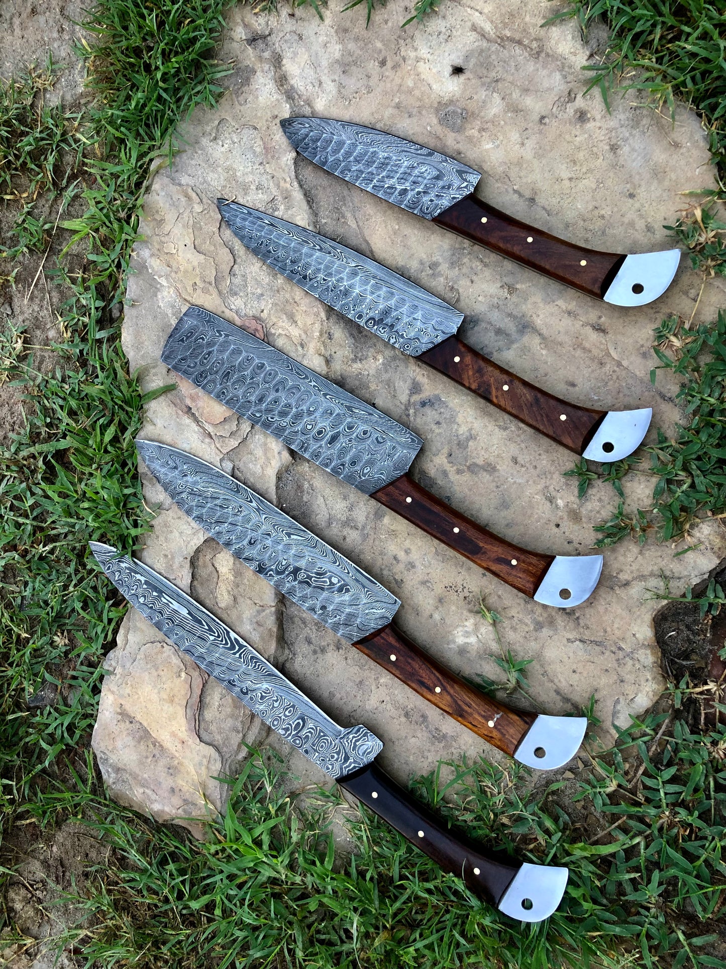 5 Damascus Knives on stone